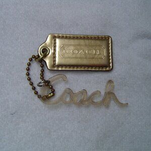 AUTHENTIC COACH GOLD METALLIC LEATHER AND GOLD COACH ACRYLIC HANG TAGS    VGC